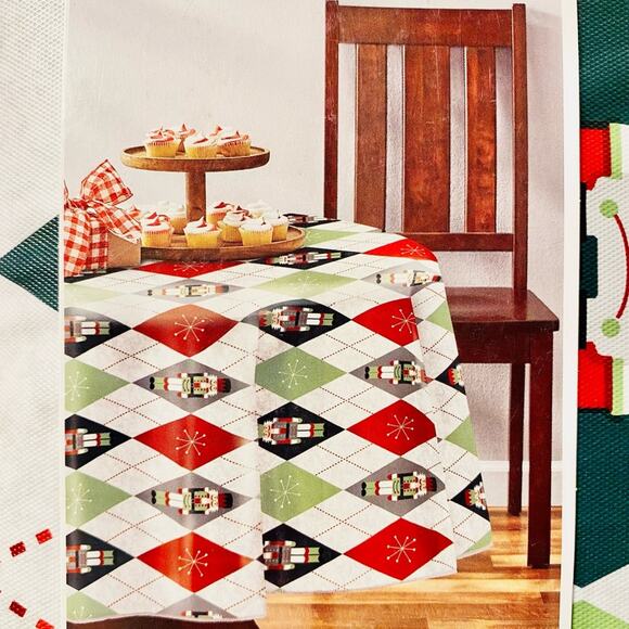 HOLIDAY TIME • Argyle Nutcracker Peva Tablecloth | 70 in Round - Picture 1 of 2